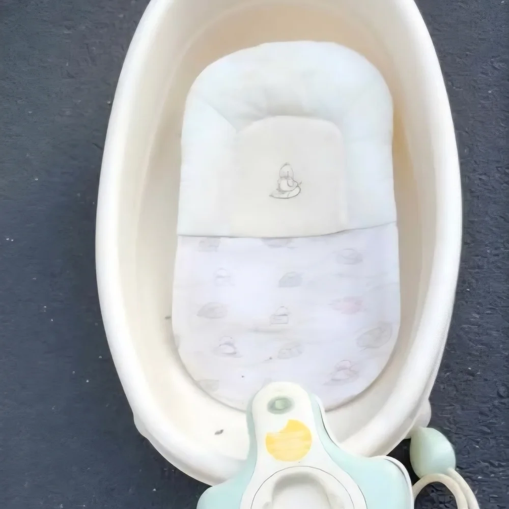 The First Years cream infant